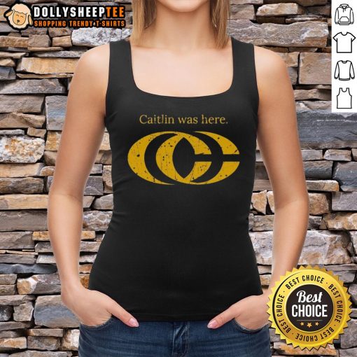 Caitlin Clark wearing a stylish tank top with a 'CC' logo, showcasing trendy sports fashion.