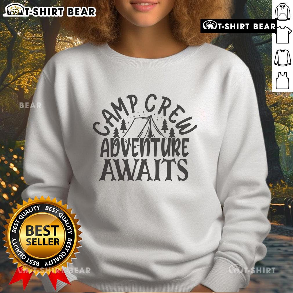 Pretty Camp Crew Adventure Awaits Sweatshirt Cozy Pretty Camp Crew Adventure Awaits Sweatshirt in a rustic outdoor setting, perfect for camping enthusiasts.