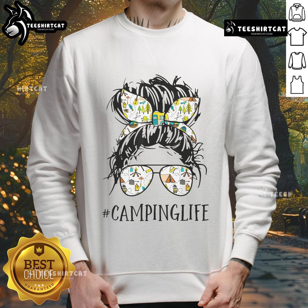 Pretty Camping Life Mom Messy Bun Mom Camping Life Sweatshirt Mom in a messy bun wearing a 'Pretty Camping Life' sweatshirt, enjoying a cozy camping experience in nature.