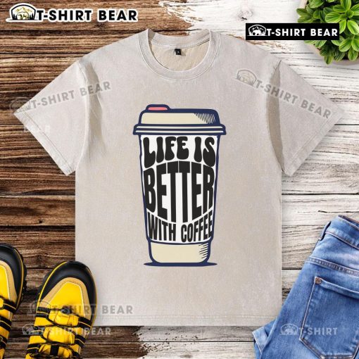 Pretty coffee cup with 'Life Is Better With Coffee' washed t-shirt, perfect for coffee lovers and casual wear enthusiasts.