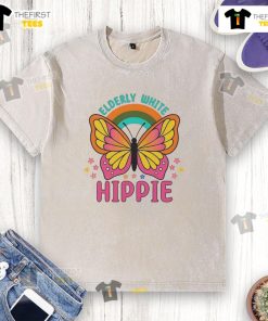 Alt Text: Retro butterfly rainbow flower t-shirt worn by a pretty elderly white hippie, showcasing vibrant colors and a vintage style.