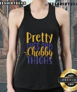 Model wearing a 'Pretty Eyes and Chubby Thighs' tank top, showcasing a stylish design perfect for casual summer outfits.