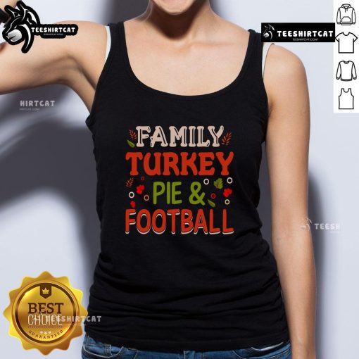 Pretty family enjoying a turkey pie dinner while wearing a football tank top, celebrating togetherness and festive traditions.