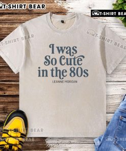 Leanne Morgan wearing a vintage washed T-shirt, showcasing her cute 80s style in a charming outdoor setting.