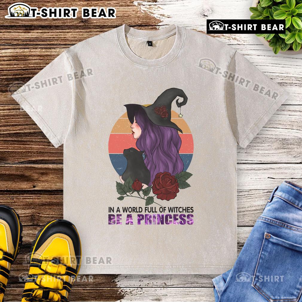 Pretty In A World Full Of Witches Be A Princess Halloween Washed T Shirt Pretty in a World Full of Witches Be a Princess Halloween washed t-shirt, perfect for festive fall celebrations.