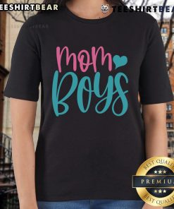 Pretty mom wearing a stylish tee with her two boys, showcasing family bonding and trendy fashion in casual attire.