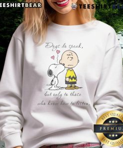 Alt Text: Pretty Snoopy Peanuts sweatshirt featuring dogs with the quote: 'Dogs do speak but only to those who know how to listen.'