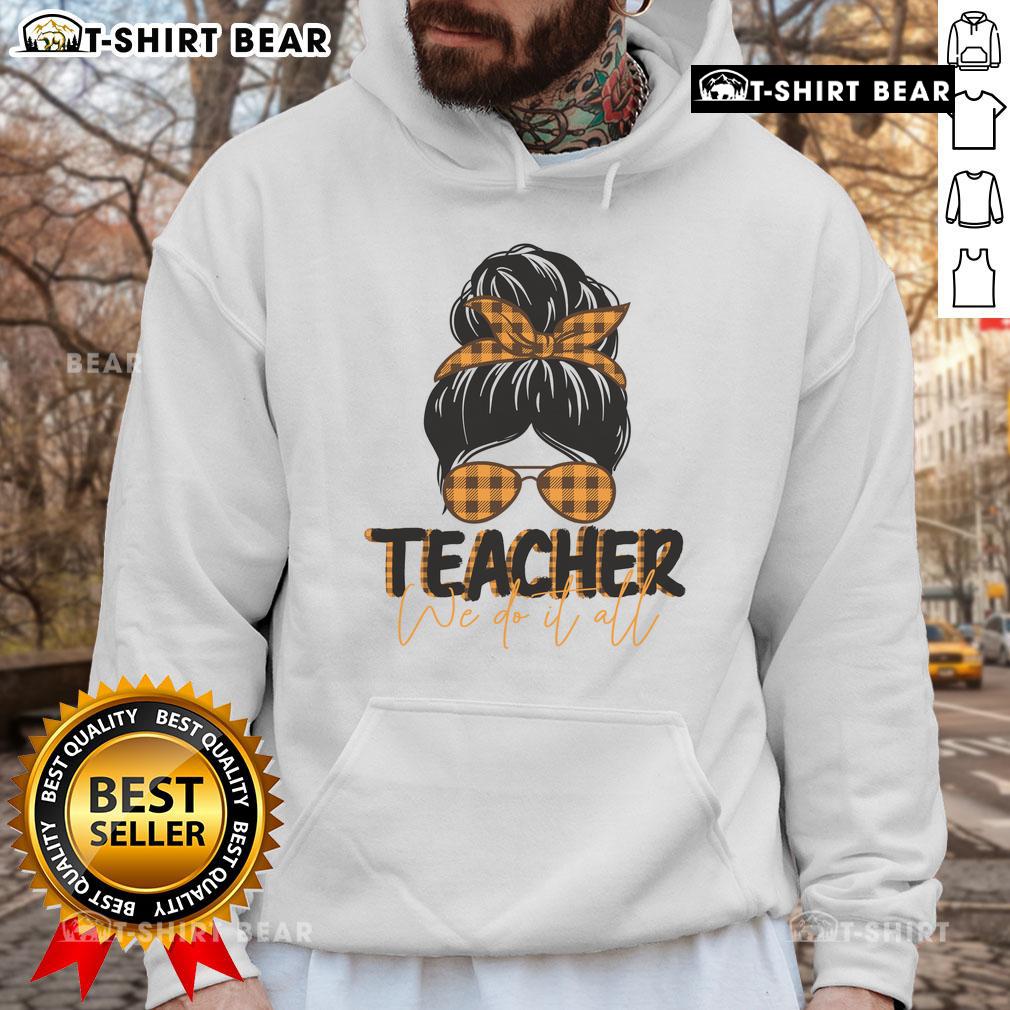 Pretty Teacher We Do It All Messy Bun Hoodie Alt Text: Pretty teacher in a messy bun wearing a cozy hoodie, showcasing the We Do It All spirit in a classroom setting.