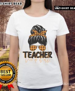 Pretty teacher wearing a messy bun in a stylish 'We Do It All' ladies tee, perfect for classroom or casual wear.