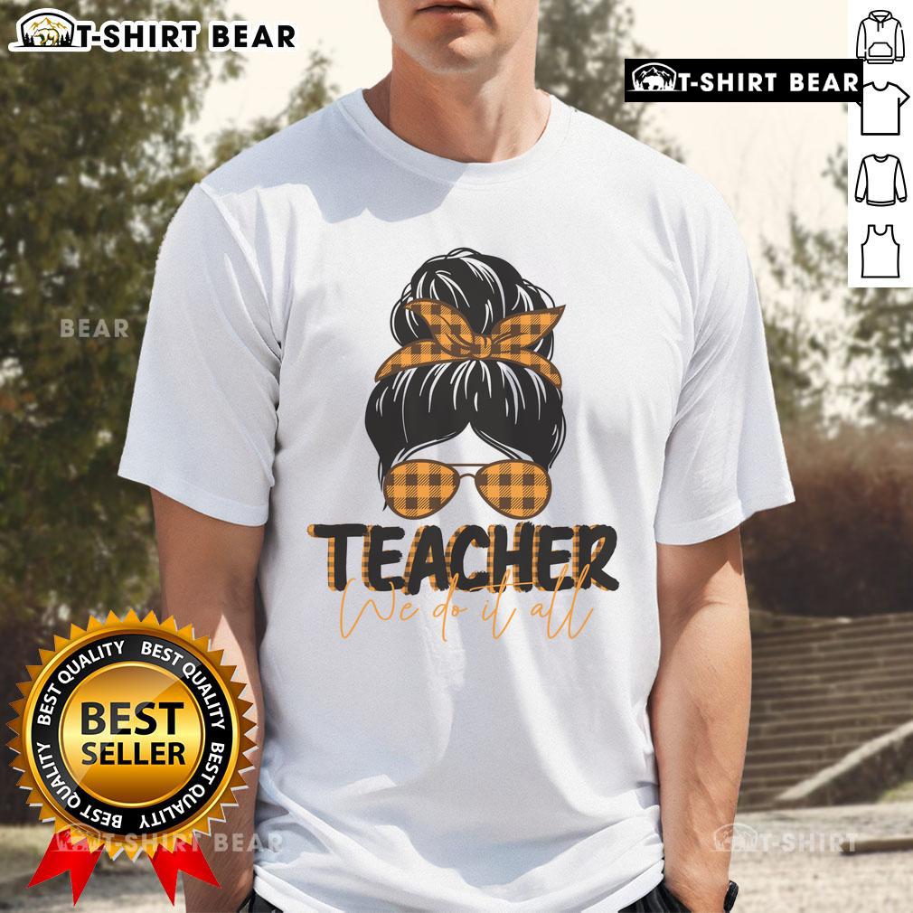 Pretty Teacher We Do It All Messy Bun T Shirt Pretty teacher wearing a 'We Do It All' messy bun t-shirt, showcasing a stylish and casual classroom look.