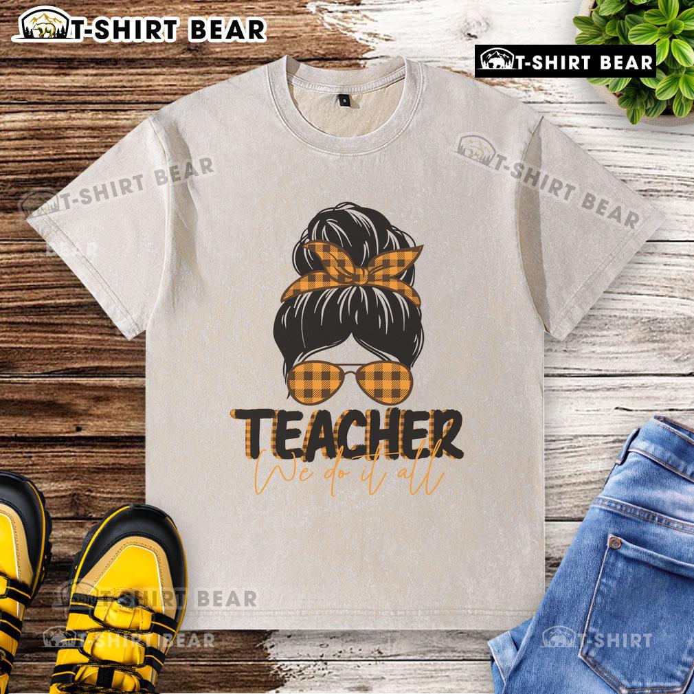 Pretty Teacher We Do It All Messy Bun Washed T Shirt Pretty teacher with a messy bun wearing a washed T-shirt, showcasing a casual and stylish classroom vibe.