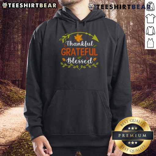 Cozy Thanksgiving hoodie with 'Thankful Grateful Blessed' design, perfect for autumn gatherings and holiday celebrations.