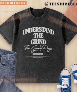 Unshakeable 'The Grind Pays' washed t-shirt showcasing a stylish design for motivation and inspiration in life.