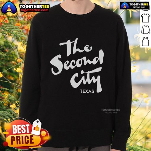 Cozy Pretty The Second City Texas sweatshirt displayed on a rustic wooden background, perfect for casual wear.