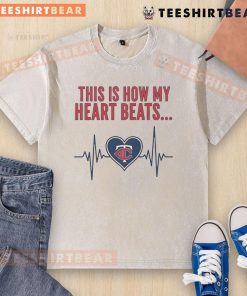 Alt Text: Pretty This Is How My Heart Beats Minnesota Twins washed t-shirt displayed on a hanger, showcasing team spirit.