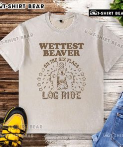 Alt Text: Pretty wet beaver on a log ride at an amusement park, showcasing a washed t-shirt and splashes of water.