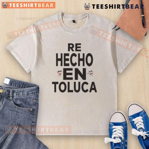 Alt Text: Top Alexis Vega Re Hecho En Toluca washed t-shirt featuring a stylish design and vibrant colors for casual wear.