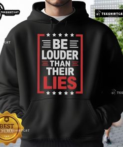 Top Be Louder Than Their Lies Hoodie in black, featuring bold white text, perfect for making a statement in casual fashion.