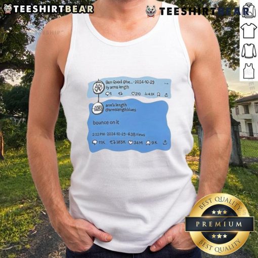 Model wearing Top Ben Quad Ily Arms Length Bounce On It Tank Top in a vibrant outdoor setting, showcasing its stylish design.