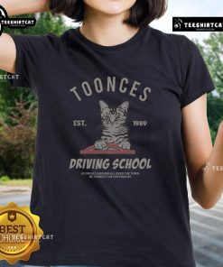 Alt Text: Top Cat Toonces The Driving School Est 1989 Ladies Tee featuring a fun design perfect for cat lovers and driving enthusiasts.