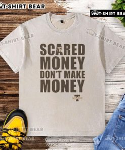Top Coach T-shirt featuring 'Scared Money Don't Make Money' slogan, perfect for casual wear and motivational style.