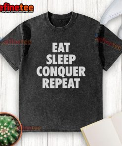 Top Eat Sleep Conquer Repeat washed t-shirt in a casual setting, showcasing the trendy design and vibrant colors.
