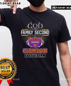 Top God First Family Second Then Clemson Football T-Shirt design featuring bold text in Clemson colors on a casual tee.