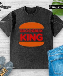 Top GrooGrux King logo on a washed t-shirt, showcasing a stylish and vibrant design for fans of the band.