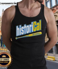 Alt Text: Cal Raleigh wearing the Big Dumper tank top, a top historical catcher in baseball, showcasing his signature style.