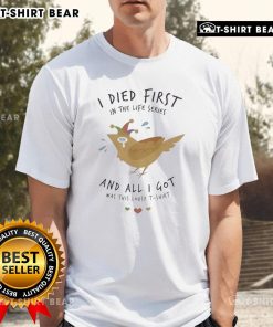 Alt Text: Top I Died First In The Life Series T-shirt featuring bold text and a humorous design, perfect for fans.