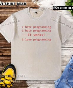 Top I Hate Programming, It Works, I Love Programming washed t-shirt design featuring playful text on a casual tee.