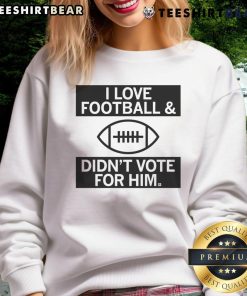Cozy 'I Love Football And Didn't Vote For Him' sweatshirt in navy blue, perfect for football fans and casual wear.