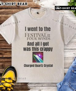 Alt Text: Top I Went to the Festival of the Four Winds washed t-shirt displayed on a wooden background.