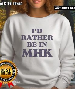 Cozy Top-Id-Rather-Be-In-MHK sweatshirt displayed on a wooden background, perfect for fans of Manhattan, Kansas.