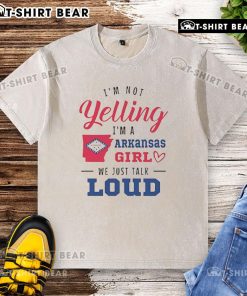 Top 'Im Not Yelling, Im an Arkansas Girl, We Just Talk Loud' washed t-shirt, perfect for showcasing Southern pride.