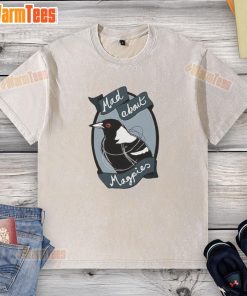 Alt Text: Top Mad About Magpies logo on a washed t-shirt, featuring a stylish design perfect for fans of the team.