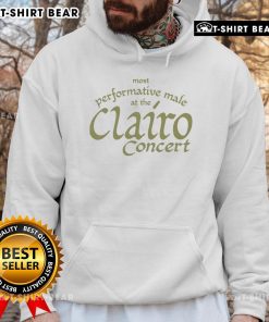 Top most performative male at the Clairo concert wearing a stylish hoodie, showcasing vibrant energy and enthusiasm.