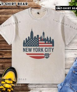 Alt Text: Top New York City travel souvenir flag series washed t-shirt featuring iconic NYC skyline design.