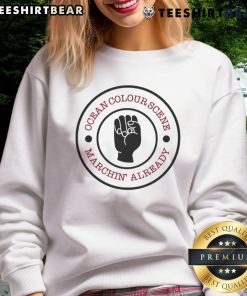 Alt Text: Top Ocean Colour Scene Machine Already sweatshirt featuring vibrant design and stylish fit for music fans.
