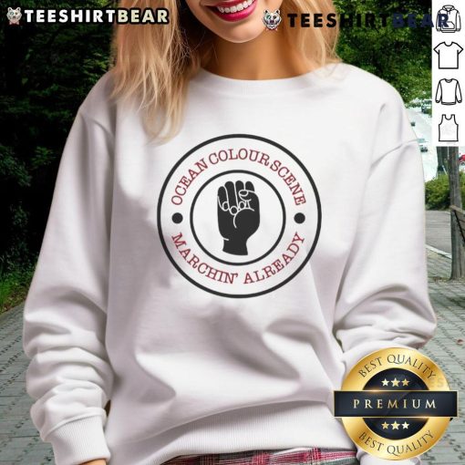 Alt Text: Top Ocean Colour Scene Machine Already sweatshirt featuring vibrant design and stylish fit for music fans.