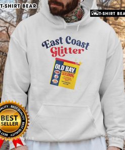Cozy hoodie featuring 'Top Old Bay East Coast Glitter Seasoning for Seafood' design, perfect for seafood lovers.