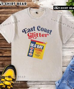 Stylish washed T-shirt featuring Top Old Bay East Coast Glitter Seasoning design, perfect for seafood lovers.