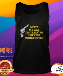 Man wearing a 'Top Outta My Way I'm Tryin' to Impress Jodie Foster' gun tank top, showcasing a casual, humorous style.