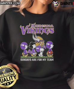 Alt Text: Cozy sweatshirt featuring Top Peanuts characters cheering for the Minnesota Vikings on NFL Sundays.