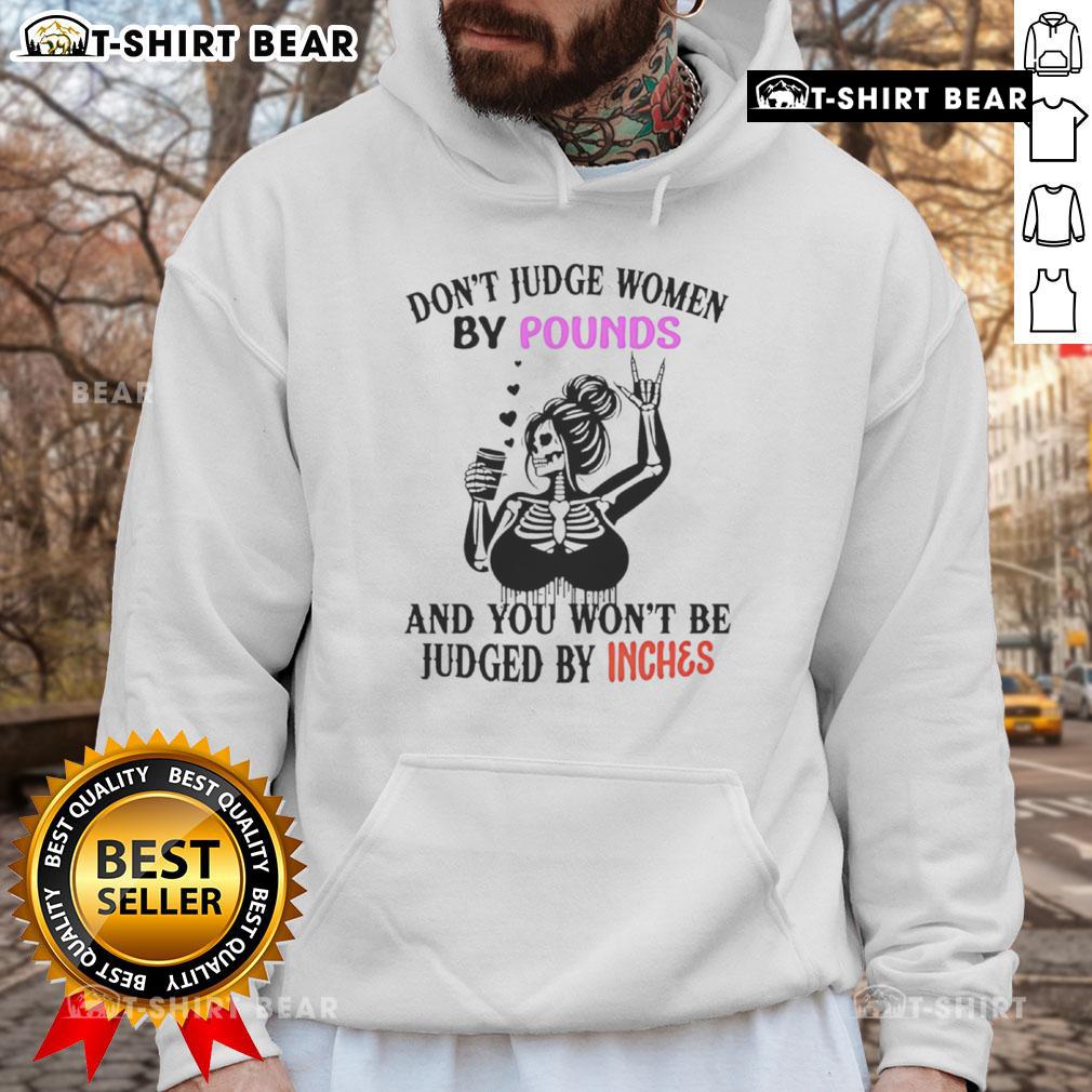 Top Skeleton Don't Judge Women By Pounds And You Won't Be Judged By Inches Hoodie Top Skeleton hoodie with 'Don't Judge Women By Pounds And You Won't Be Judged By Inches' slogan, stylish and empowering.