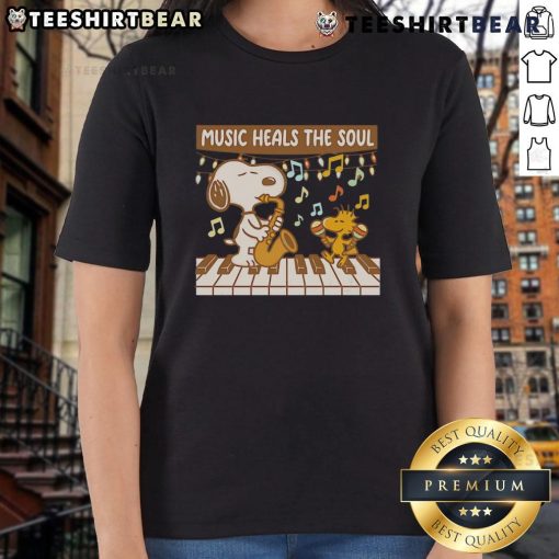 Top Snoopy and Woodstock Piano Music Heals the Soul ladies tee featuring vibrant graphics and a fun design for music lovers.