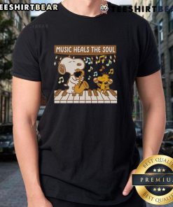 Alt Text: Top Snoopy and Woodstock piano music heals the soul t-shirt featuring vibrant graphics of Snoopy and Woodstock.