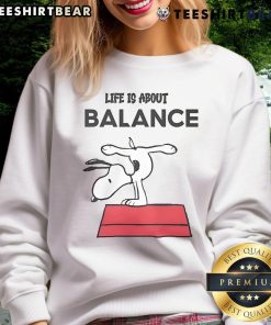 Alt Text: Cozy 'Top Snoopy Life Is About Balance Sweatshirt' featuring Snoopy graphic, perfect for casual wear and comfort.