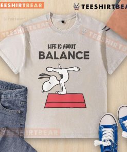 Top Snoopy Life Is About Balance Washed T-Shirt featuring a playful Snoopy graphic and relaxed fit for casual style.