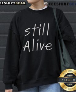 Cozy Top Still Alive Sweatshirt featuring a trendy design, perfect for casual wear and staying stylish all year round.